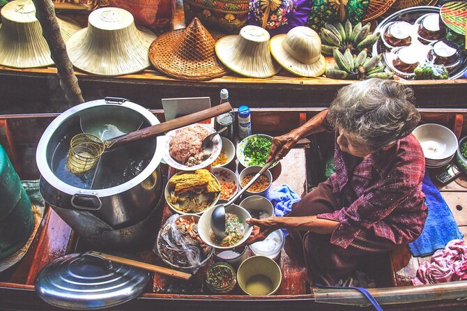 Damnoen Saduak Floating Market & Maeklong Railway Market Tour From Bangkok - Food, photos, and shopping without losing the plot