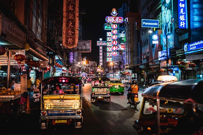 Discover Bangkok at Night 5-Hour Bike Tour with dinner - Wat Arun at night: city views across the river, plus a closure note