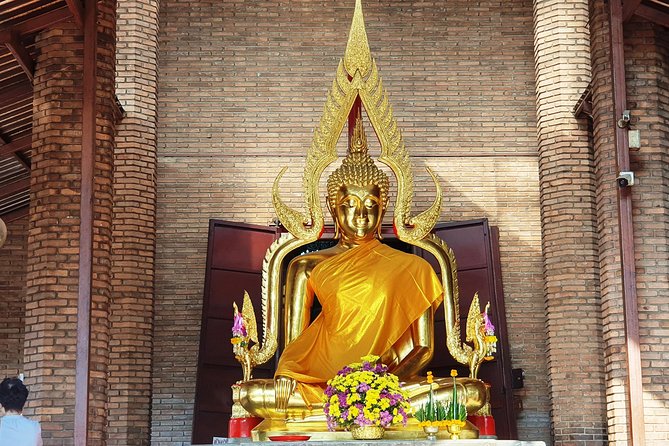 Discover UNESCO World Heritage Sites - Ayutthaya to Khao Yai National Park - Wat Mahathat: the tree-and-head moment (and respectful photos)
