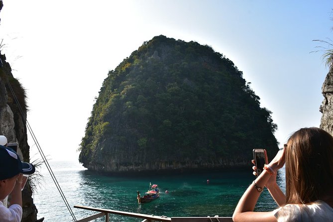 Early Bird Phi Phi Island & 4 Islands Speed Boat Tour from Krabi - Phi Phi Leh and Pileh Bay: photos, cliffs, and real snorkeling water