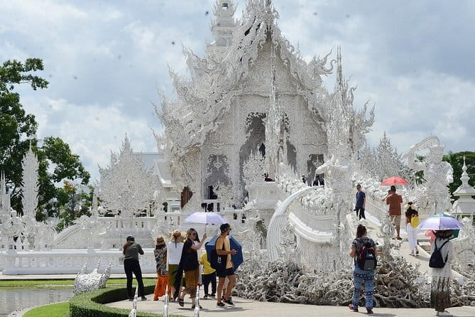 Exclusive Northern Thailand Tours - Stop 2: Wat Rong Seur Ten (Blue Temple) with gold-and-blue drama