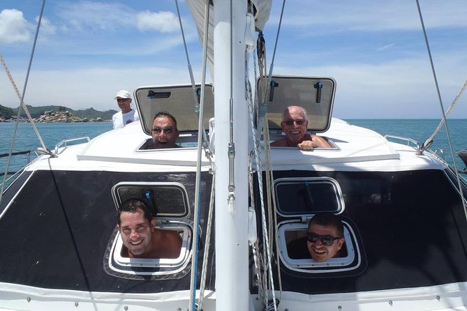 Exclusive private catamaran island hopping experience - Stop 1: Koh Phangan bay time for swimming, snorkeling, and paddle boarding