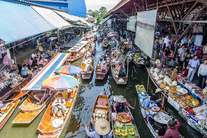 Famous Markets Tour: Maeklong Railway & Damnoen Saduak Floating - Damnoen Saduak Floating Market: Boats, Canals, and Morning Trade