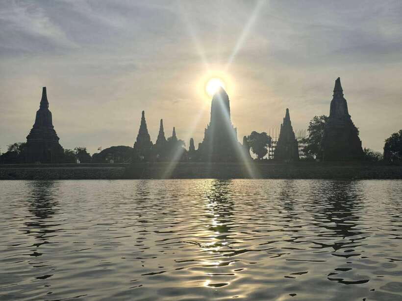 From Bangkok: Ayutthaya Afternoon Tour with Boat & Tuk-Tuk - Wat Mahathat: the Buddha head in tree roots (and why it sticks with you)
