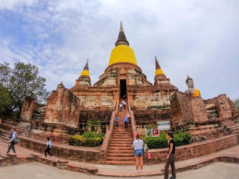 From Bangkok: Ayutthaya & Ayothaya Floating Market Day Trip - Transport, timing, and dressing for Thai temple rules