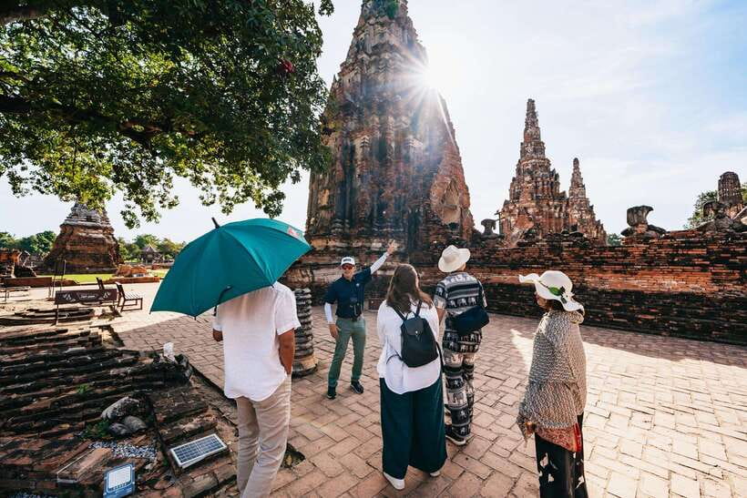 From Bangkok: Ayutthaya Temples Guided Tour with Lunch - Wat Mahathat: the Bodhi tree and Buddha head in the roots