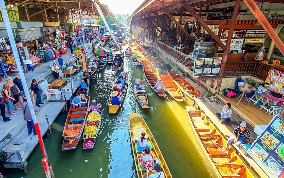 From Bangkok: Damnoen Saduak & Train Market Tour in Spanish - Longtail Boat Ride: The Way to Enter the Floating Market