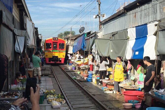 From Bangkok: Kanchanaburi Tour with Floating Market Visit - Kra Sae Cave stop: a short visit that sets up the train moment