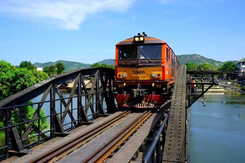 From Bangkok: Kanchanaburi War Cemetery and Death Railway.. - Bridge over the River Kwai: the famous walk, with real context