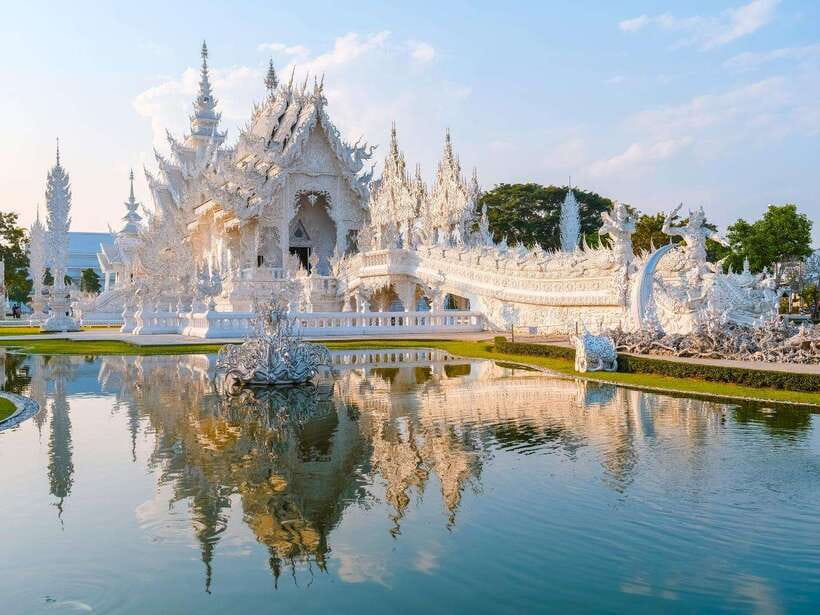 From Chiang Mai: Chiang Rai Famous Temples Guided Tour - Wat Rong Khun White Temple: Contemporary Buddhism With a Famous Look
