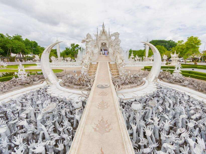 From Chiang Mai: Chiang Rai Famous Temples Guided Tour - Mae Kachan Hot Spring: A Scenic Reset Before the Temples