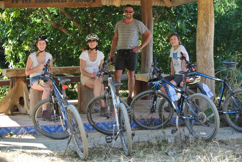 From Chiang Mai: Mae Taeng Valley and Waterfalls Cycle Tour - Wat Ban Den Temple: More Than a Quick Photo Stop