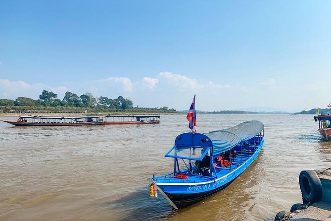 From Chiang Mai: White and Blue Temple & Golden Triangle Day Trip - The Mekong Boat Ride That Breaks Up the Drive