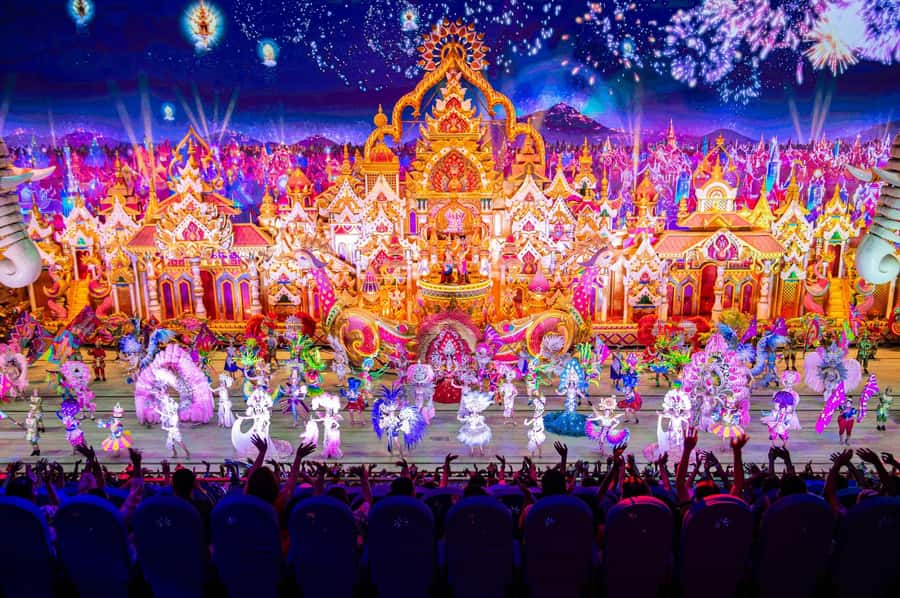 From Khao Lak: Carnival Magic Phuket Ticket with Transfer - Rides and show flow: Ferris wheel energy meets performance pacing