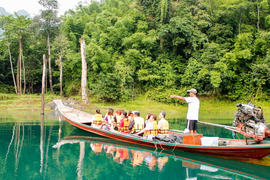 From Khao Lak: Full-Day Cheow Lan Lake with Cave Tour - Bamboo Rafting on the Khao Sok River: Peace, Wildlife, and Bamboo Coffee