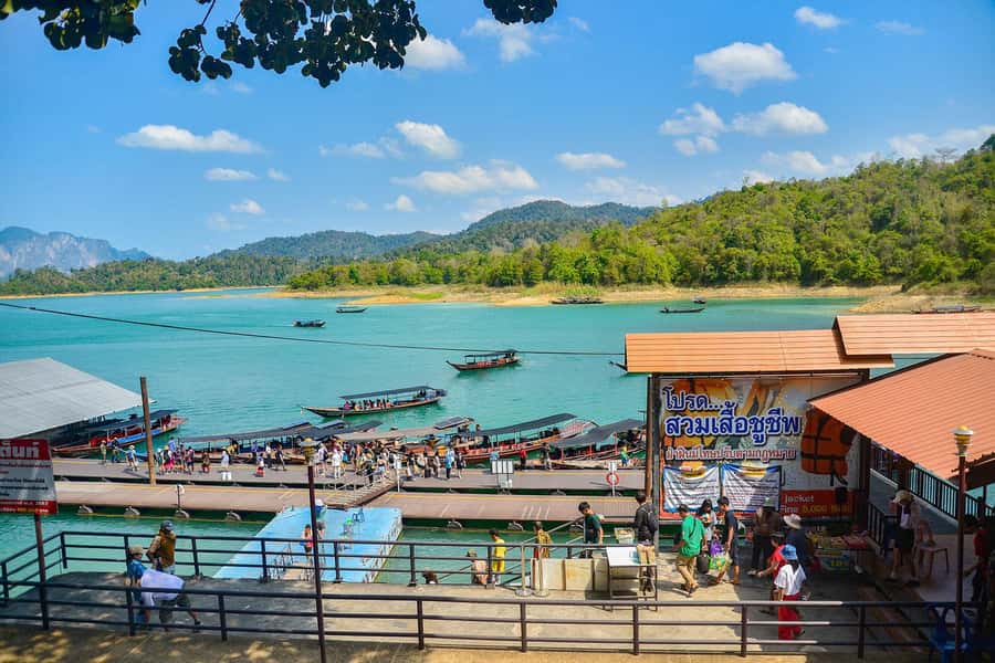 From Krabi: Khao Sok Cheow Lan Lake Day Trip - Coral Cave and Nam Ta Lu Cave: coral rock formations, real-time drama