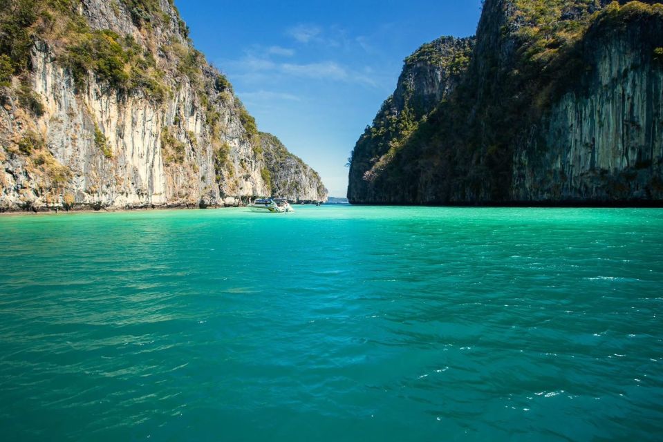 From Phi Phi: Half-Day Longtail Boat Tour with Snorkeling - Maya Bay Time: Beautiful, Crowded, and Fee-Plus
