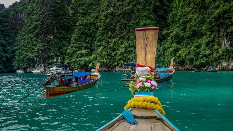 From Phi Phi: Maya Bay HalfDay Longtail Boat with Snorkeling - Optional 2:00 PM Sunset and Glowing Plankton Magic