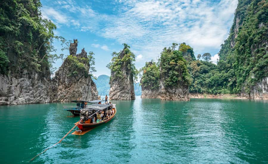 From Phuket: Cheow Lan Lake Overnight Resort Stay with Meals - First Day: Boats, Limestone Views, Jungle Walk, and Coral Cave Time