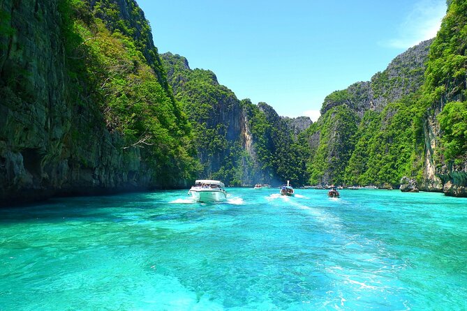 From Phuket: Phi Phi, Maya Bay & Khai Islands Speedboat Tour - Pileh Bay snorkeling: limestone cliffs and a natural swim area