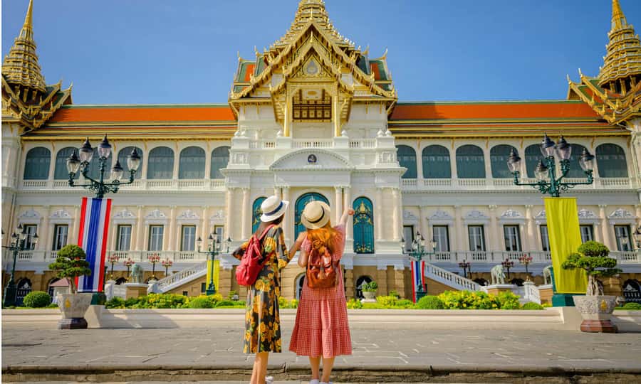 Grand Palace, Damnoen Floating Market & Maeklong Market Tour - Damnoen Saduak Floating Market: Canal Life With a Paddle Boat View
