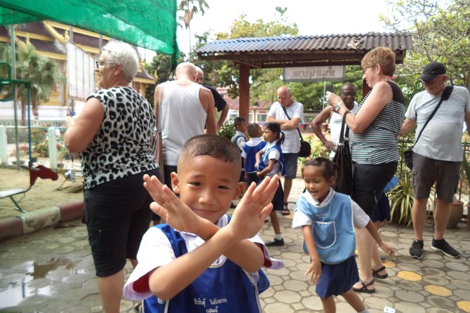 Half-Day Colors of Chiang Mai Biking Tour - School and studio time: pottery and daily education