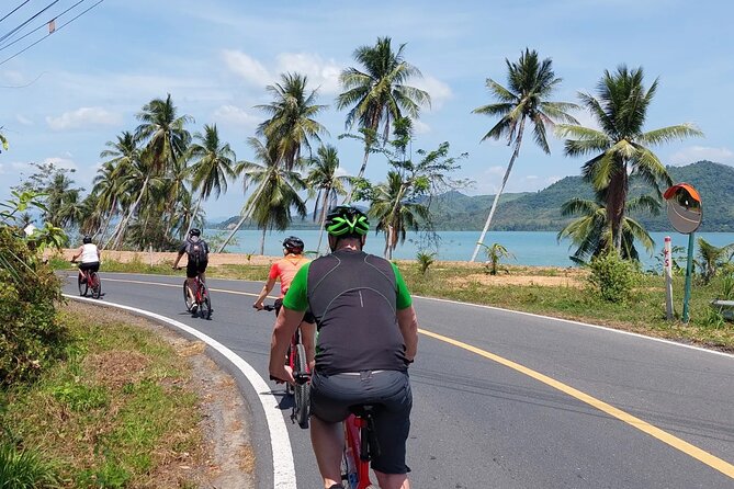 Half-Day Countryside Cycling Small-group Tour in Phuket - Stop 4: Laem Sai Pier, sea-view Thai lunch, and the calm finish