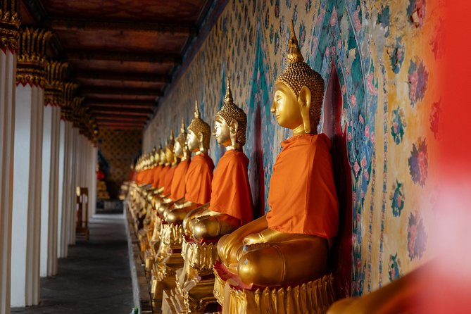Highlights & Hidden Gems With Locals: Best of Bangkok Private Tour - Stop 4: Wat Rakhang Khositaram Woramahawihan for the quieter temple vibe