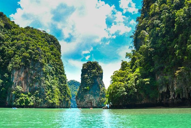 James Bond Island & Phang Nga Bay with Canoeing By Big Boat From Phuket - Ko Na Khae swimming break: quick dip, limited shoreline reality
