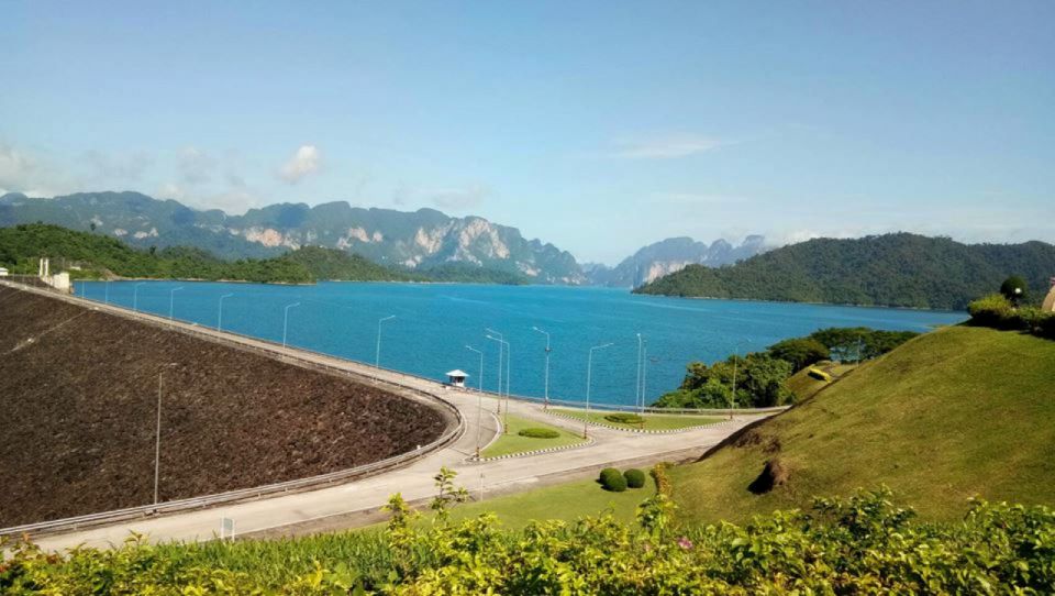 Khao Lak: Cheow Lan Lake Romantic Sunset Cruise with Drinks - Long-tail boat time on Cheow Lan Lake: swims, calm water, and iconic cliffs