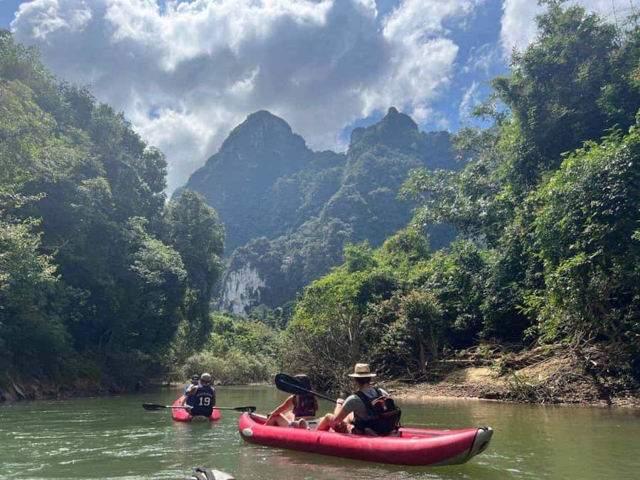 Khao Lak: Full-Day Khao Sok Jungle Walk and Canoeing Tour - Monkey Temple: feeding monkeys with respect, not chaos