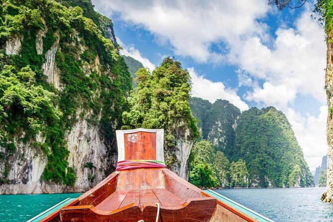 Khao Sok: Full Day Bamboo Rafting Tour from Khao Lak - Bamboo rafting on the Khao Sok River: quiet water, guided steering, real “in it” views