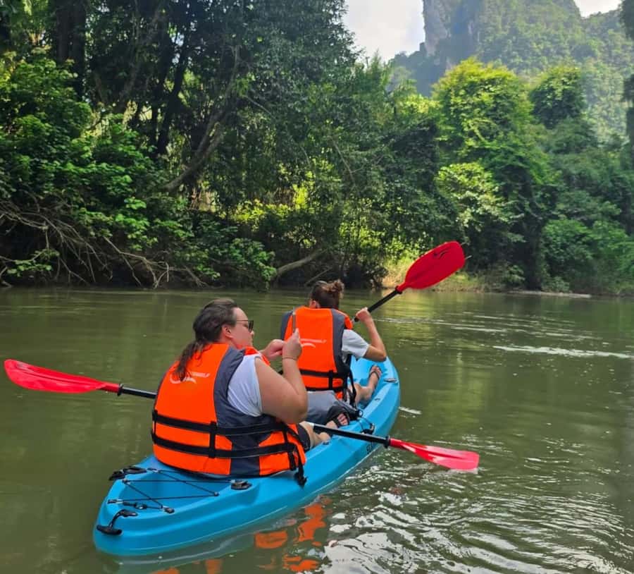 Khao Sok Park: Jungle Kayak Adventure & Wildlife Tour - Wat Tham Pla Fish Cave: Feeding Carp and Watching Monkeys Roam