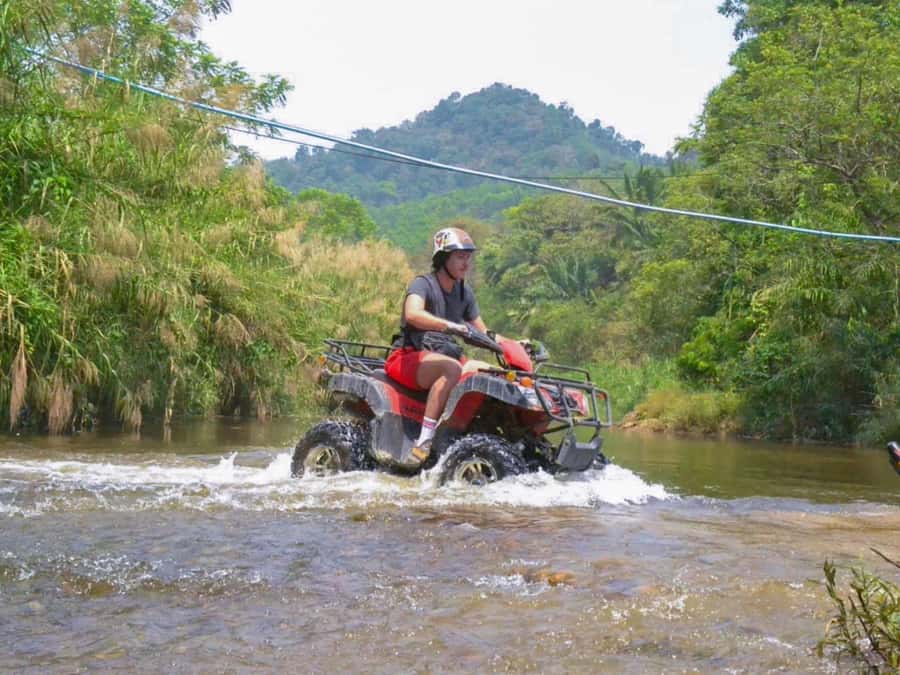 KhaoLak:ATV, ZipLine, & Rafting Adventure Monkey Cave Temple - Lunch by Song Phraek: Thai set menu, fruit, and cold drinks
