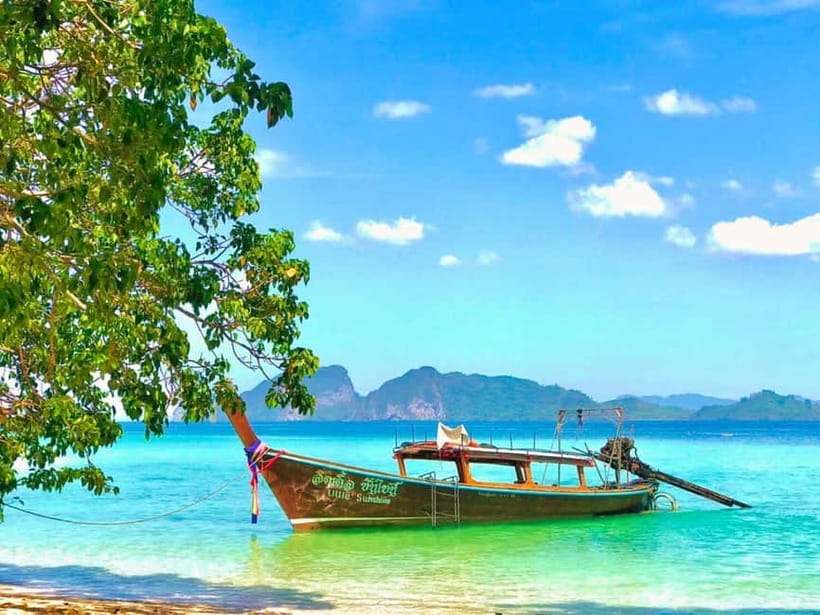 Ko Lanta: 4 Islands Snorkeling Tour by Longtail Boat - Before You Board: The Park Fee and Pier Check-In Reality