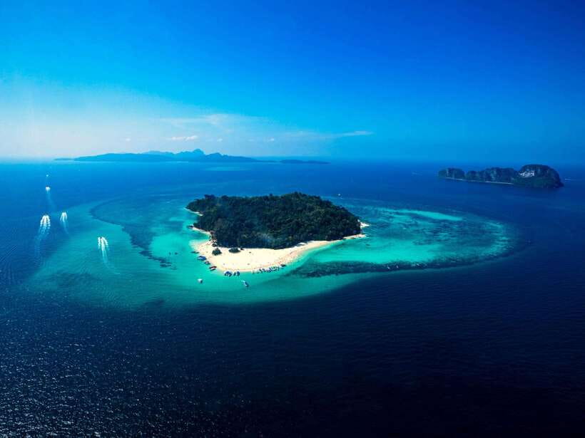 Ko Lanta: Full-Day Snorkel Trip to Phi Phi & Bamboo Islands - Phi Phi Don after lunch: streets, shops, and a different pace