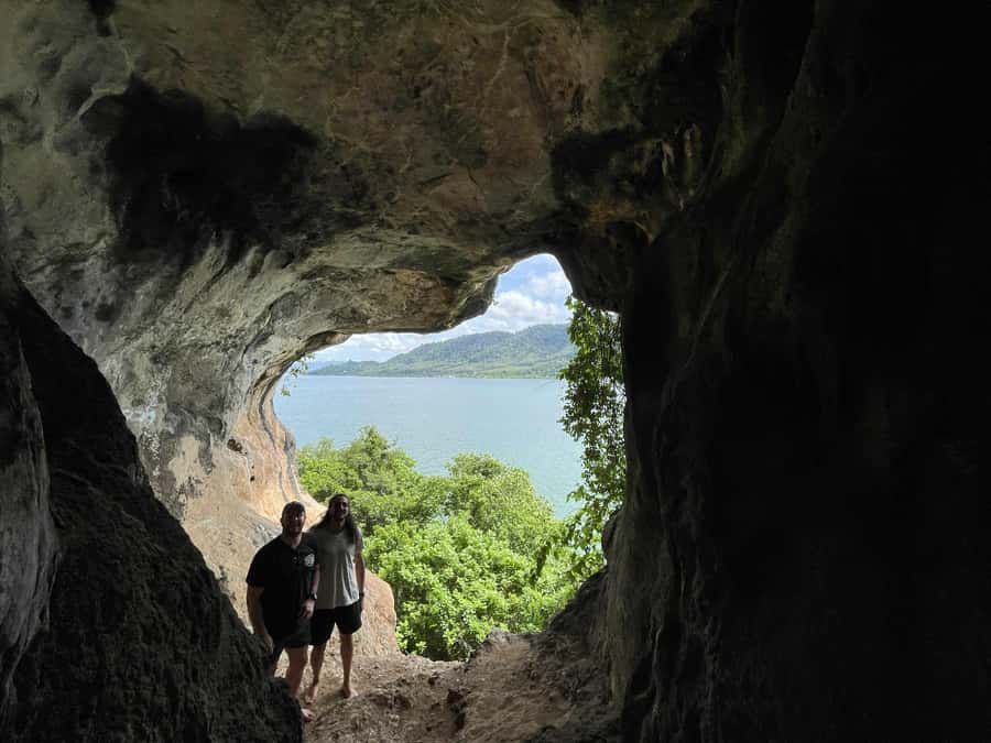 Ko Lanta: Half-Day Kayaking Koh Phee & Koh Talabeng 2 Caves - Ko Phee Island: climbing into the ghost/skull cave and seeing stalactites