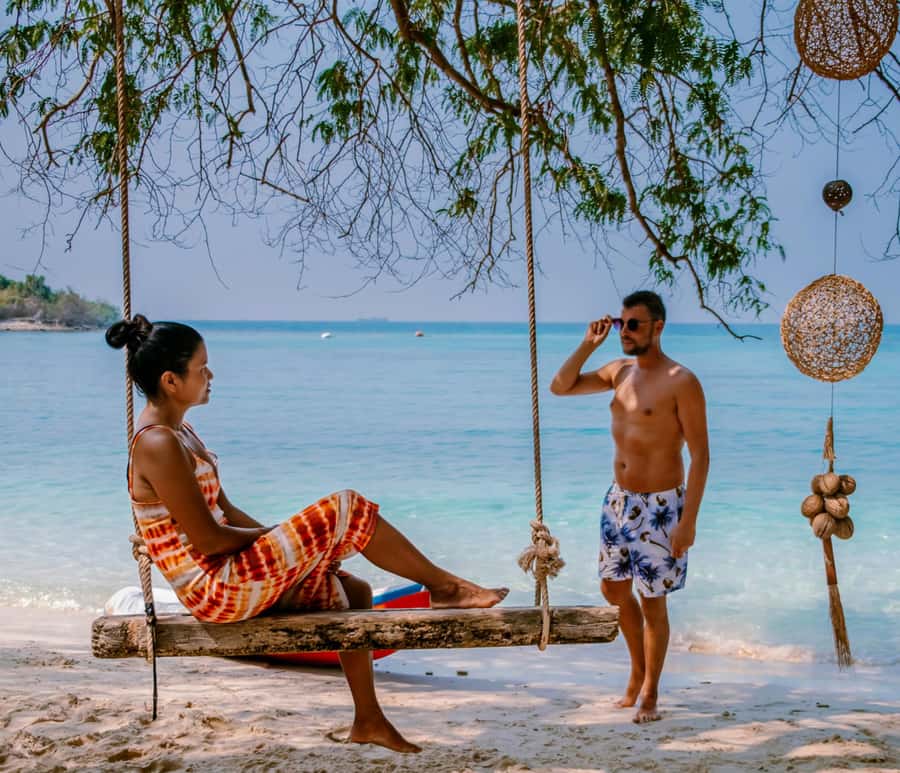 Ko Lanta: Private Sunset Long-Tail Boat Adventure Tour - Koh Kam beach time: swimming and a real pause from the motion