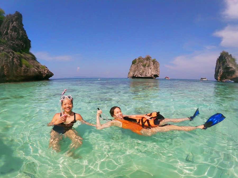 Ko Samui: Unique Ko Tao & Ko Nang Yuan Snorkeling Day Trip - The full day flow: hotel pickup, Bophut Pier snack, then speedboat