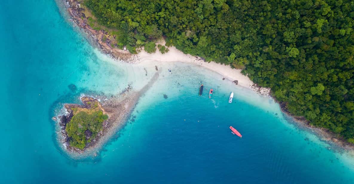 Koh Kood: Snorkeling Speedboat Tour with Lunch and Transfer - Second Snorkel Stop: Ko Raet and the Island Break Rhythm