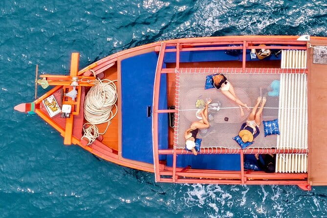 Koh Tao’s Top Snorkeling Spots by Vintage Wooden Boat - Hin Wong Bay: banana fish, rabbitfish, parrotfish, plus a small cave