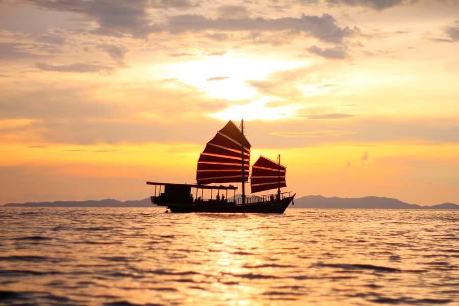 Krabi: 4-Island Sunset Snorkeling Tour & Bioluminescent Swim - The wooden junk vs. speedboats: why the vibe matters in Krabi