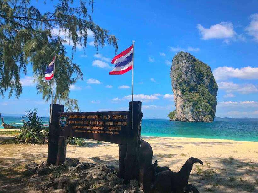 Krabi: 4 Islands Longtail Boat Tour with Lunch - Stop-by-stop: Koh Poda’s sandy cliffs and first swim hour
