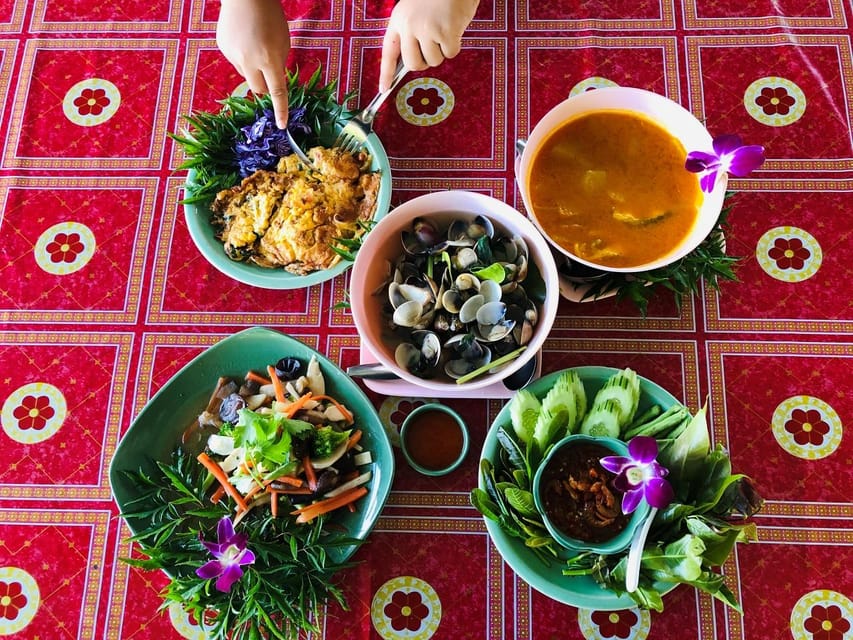 Krabi: Discover Krabi's Natural Beauty With Kayaking Tour - Paddling through mangroves, passing grotto caves, and watching the cliffs change