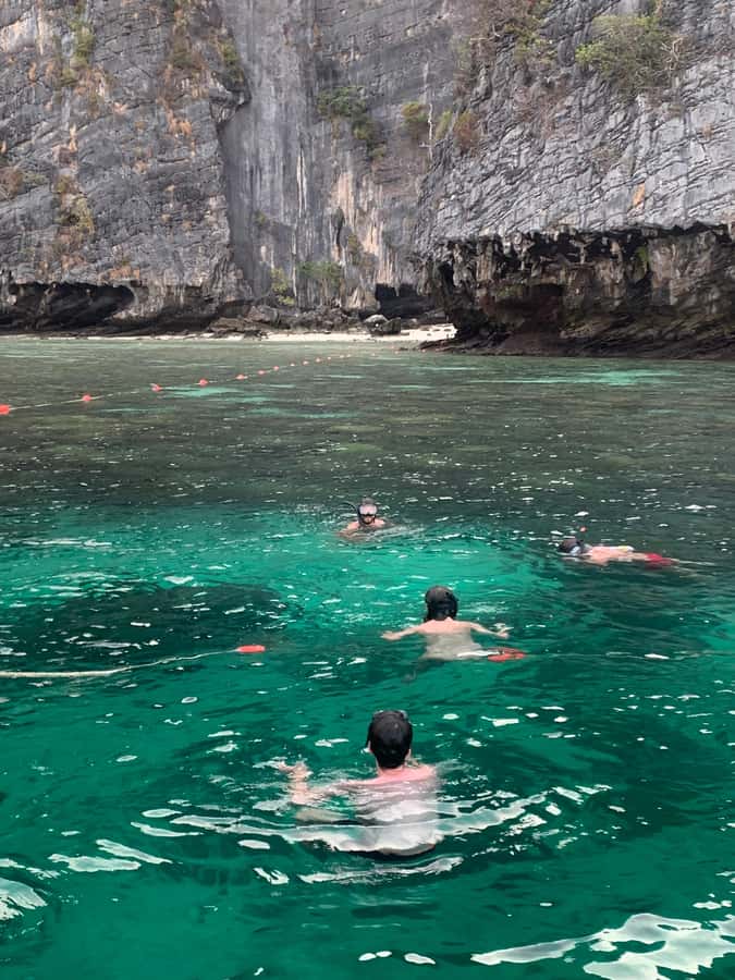 Krabi: Phi Phi Islands Longtail Boat Tour with Sunset - Natural Pools, Medicinal Herbs, and Lagoon Snorkeling in Clear Water