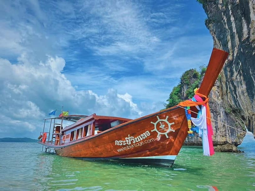 Krabi: Railay Phra Nang & Diamond Cave Sunset Plankton Tour - From Krabi pick-up to Railay cliffs: the boat ride that sets the tone