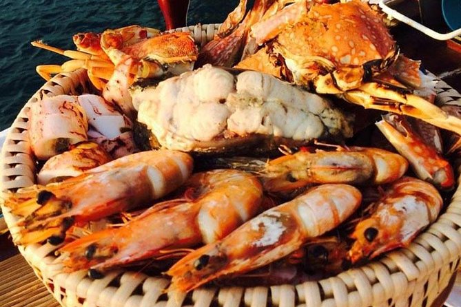 Krabi Romantic Sunset Cruise with BBQ Seafood Dinner by Krabi Sea Cruise - Stop 3: Railay Beach dinner at sea, with BBQ seafood and Thai food
