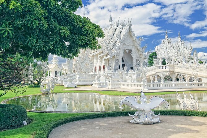 Long Neck Village, White & Blue Temple, Black House Day Tour From Chiang Mai - Wat Rong Khun White Temple: Dress Code and Crowd Reality