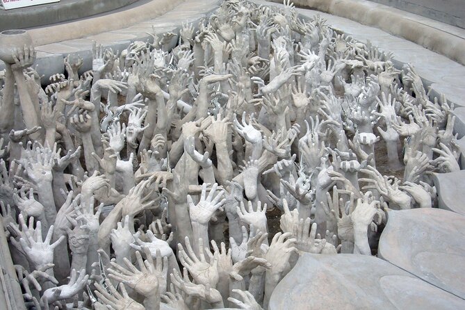 Long Neck Village, White & Blue Temple, Black House Day Tour From Chiang Mai - Wat Rong Seur Ten Blue Temple: Color That Hits From a Distance