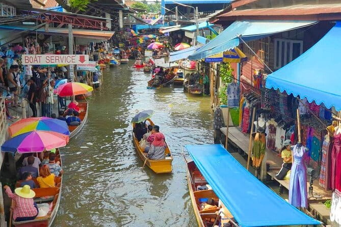 Maeklong Railway and Damnoen Saduak Floating Market Tour - Maeklong Railway Market (Hoop Rom): How to Watch the Train and Shop Like a Pro